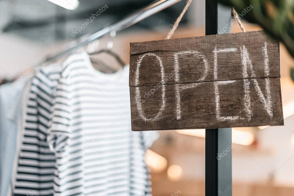 open sign on boutique