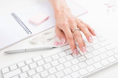 woman typing on keyboard clipart