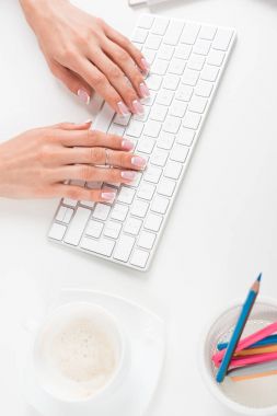 woman typing on keyboard clipart