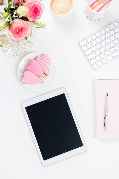 digital tablet with blank screen at workplace