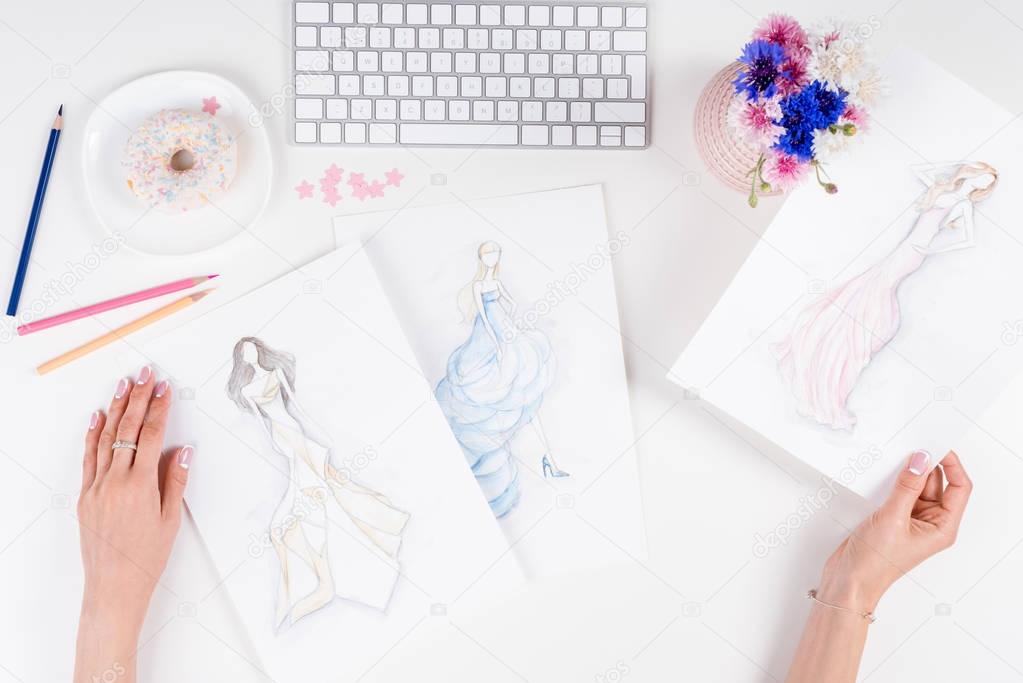 fashion designer working with sketches