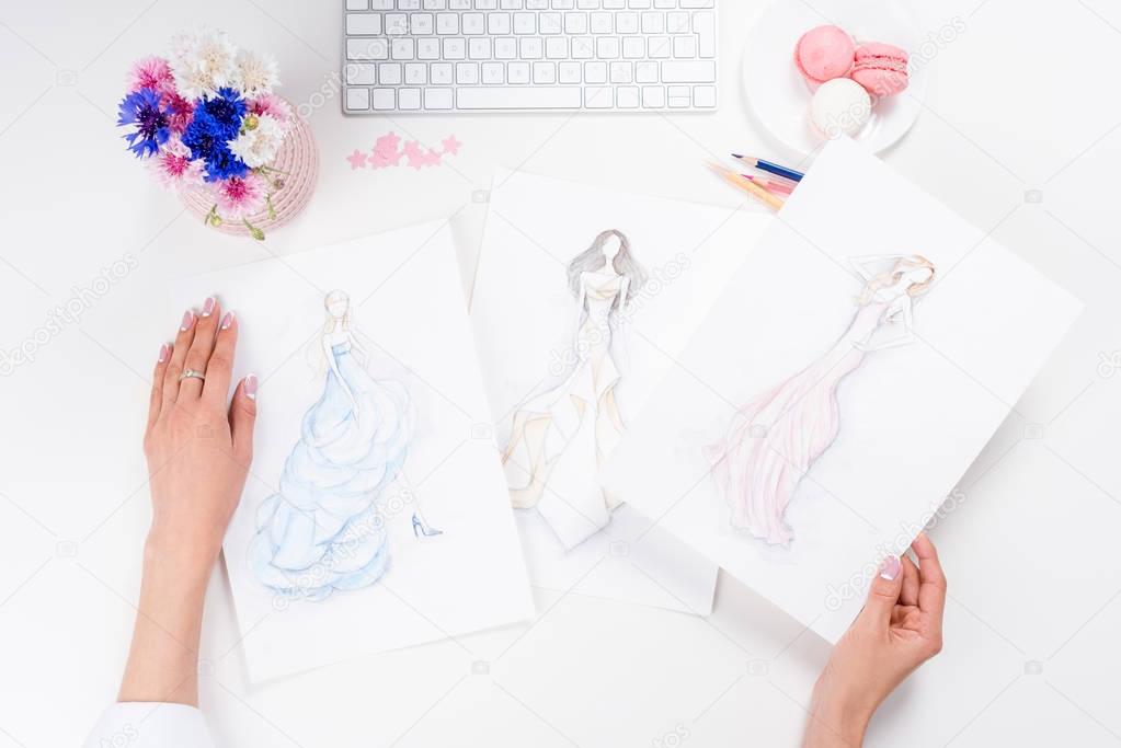 fashion designer working with sketches