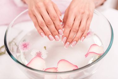 Spa treatment for female hands clipart