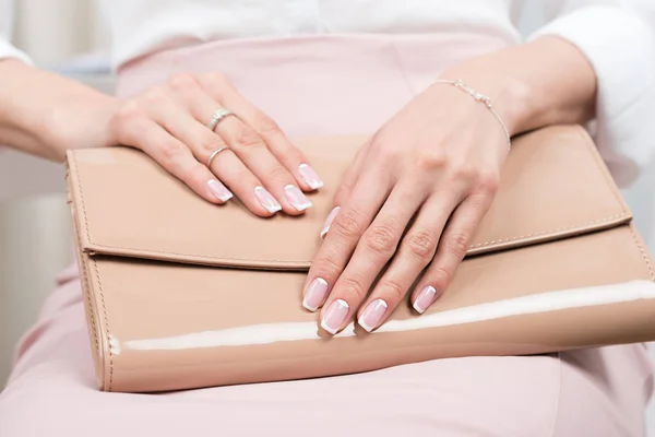 Female hands with french manicure — Stock Photo, Image