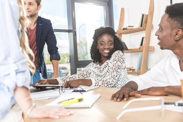 Multicultural businesspeople at meeting in office — Stock Photo, Image