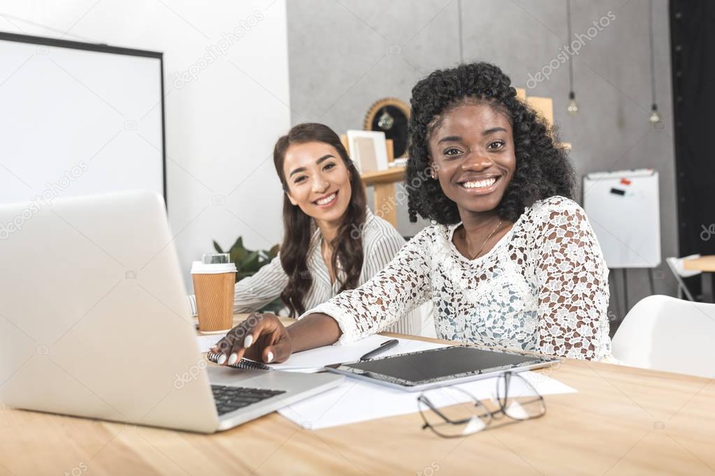 multicultural businesswomen with laptop