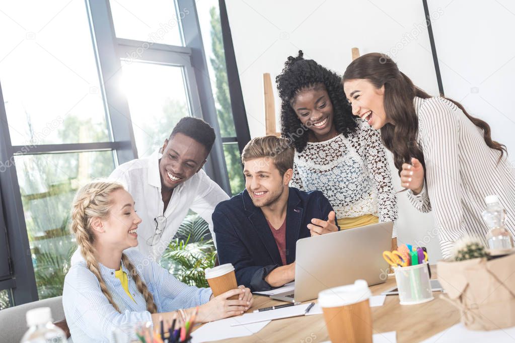 multiethnic business team with laptop