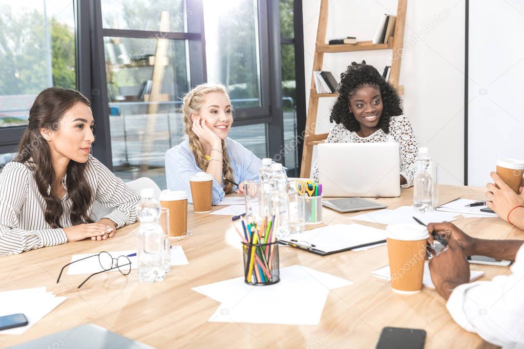 multicultural businesspeople during seminar