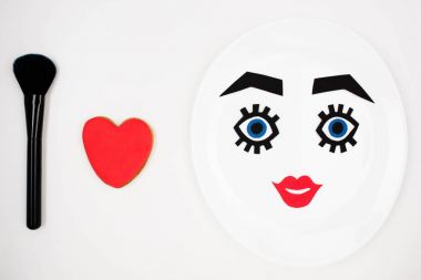 Kağıt yüz makyaj plaka üzerinde 