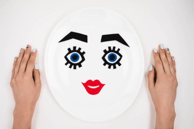 Kağıt yüz makyaj plaka üzerinde 