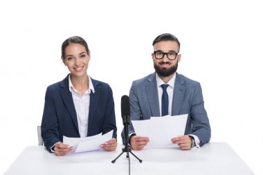 newscasters with papers and microphone clipart