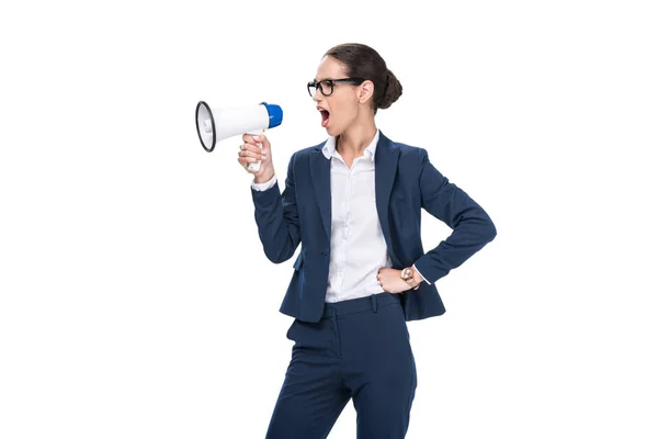 Angry businesswoman yelling with megaphone — Stock Photo, Image