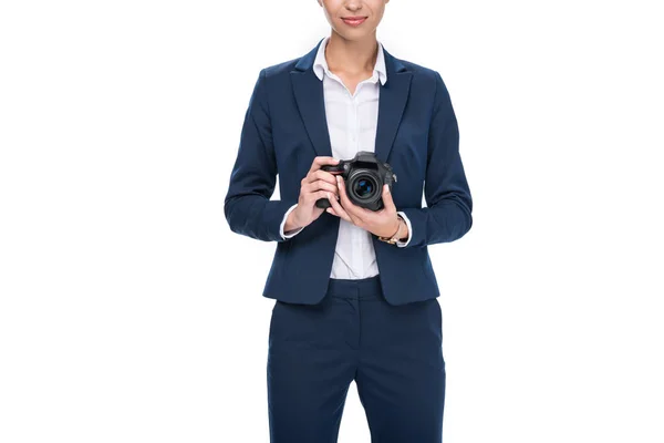 Empresário segurando câmera profissional — Fotografia de Stock