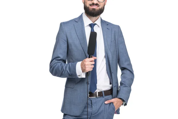 Anchorman holding microphone — Free Stock Photo