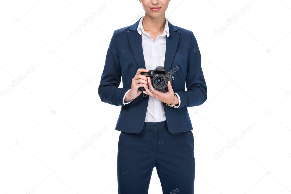 businessman holding professional camera