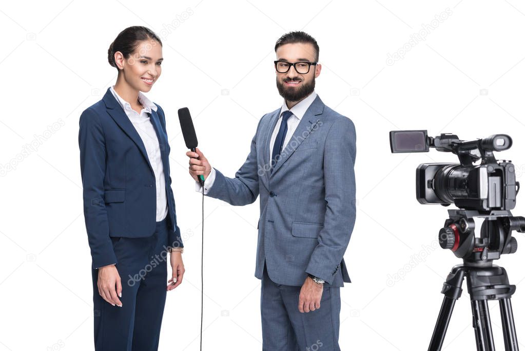 journalist interviewing a businesswoman