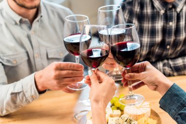friends clinking glasses of wine clipart