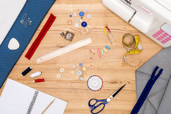 variety of equipment for tailoring on table