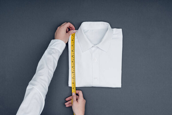 tailor measuring shirt
