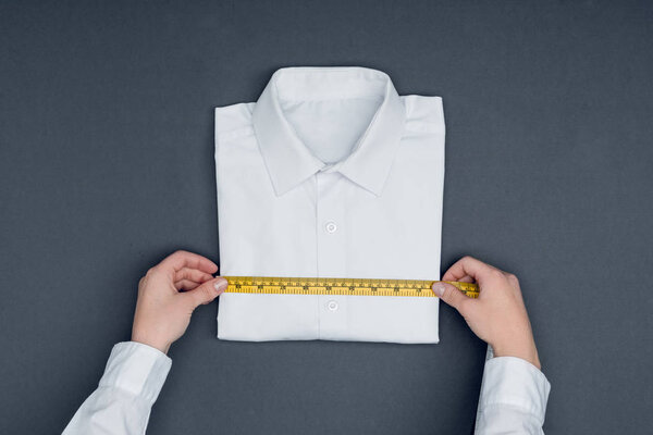 tailor measuring shirt