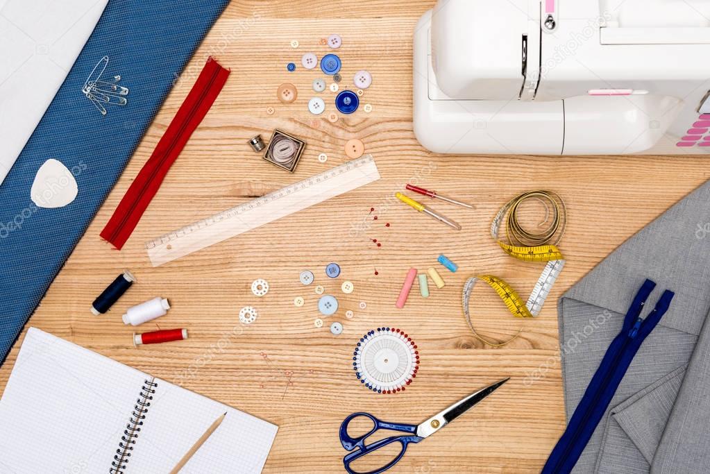 variety of equipment for tailoring on table