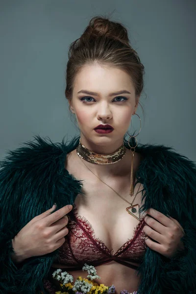 Woman in lace bra and fur coat — Stock Photo, Image