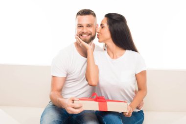young couple with gift box clipart