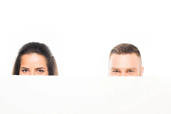 Couple looking out of banner — Stock Photo, Image