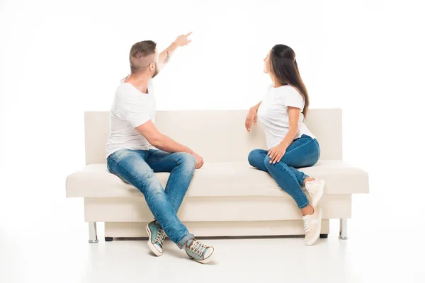 Attractive couple on couch — Stock Photo, Image