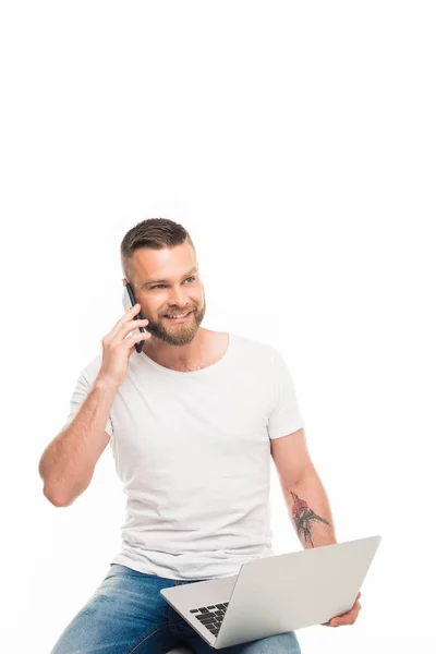 Attractive man using smartphone — Stock Photo, Image