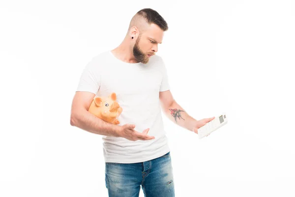Bearded man with piggy bank — Stock Photo, Image