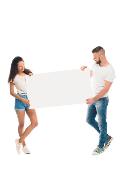 Attractive couple with blank banner