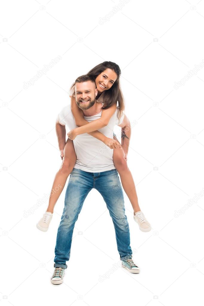 man piggybacking woman