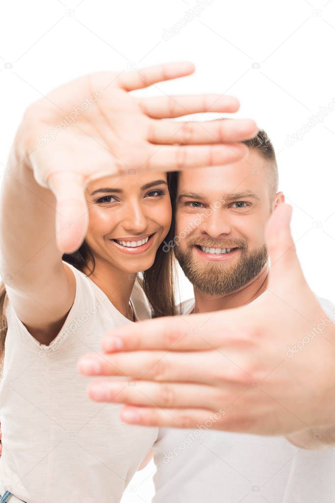 attractive couple with hands frame