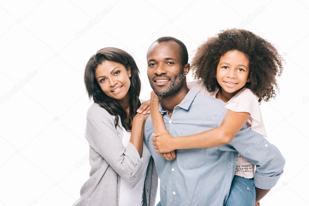 happy african american parents with daughter 