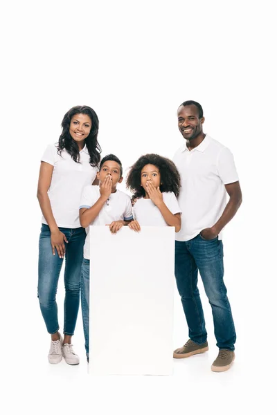 Happy african american family with banner — Stock Photo, Image