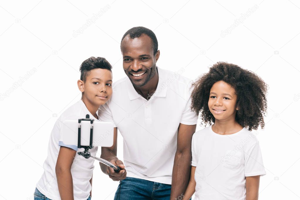 african american family taking selfie