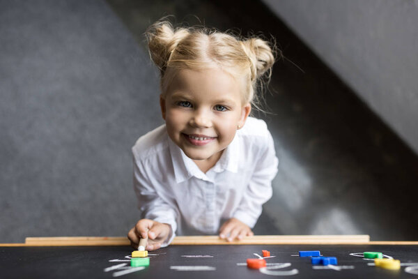 child studying numbers