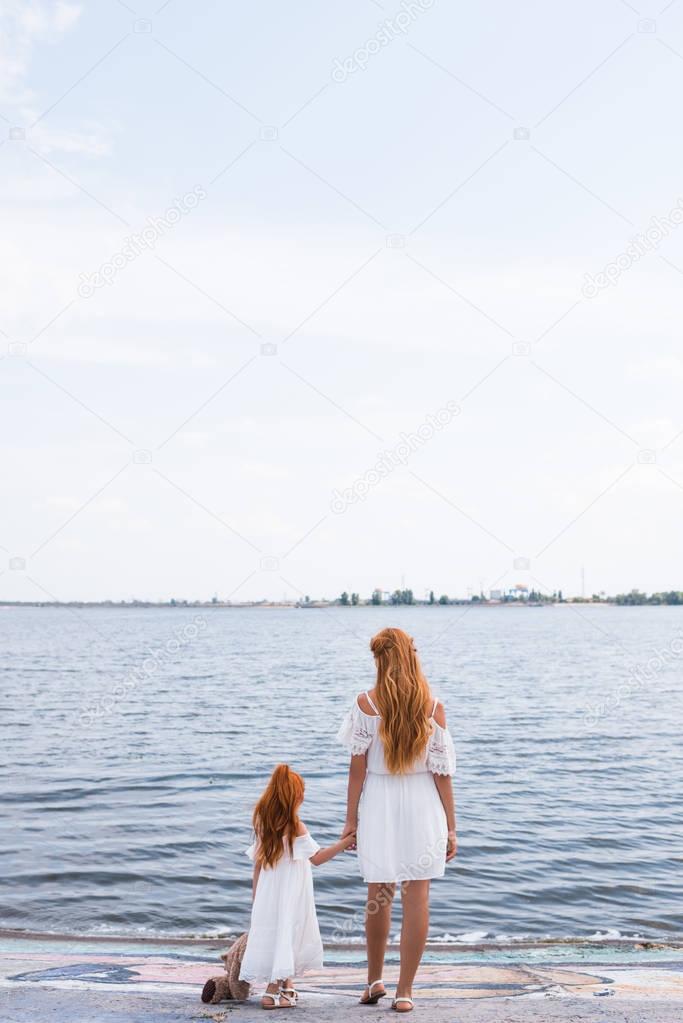 mother and daughter at seashore