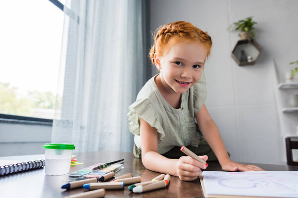 little happy girl drawing