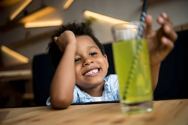 African american child drinking lemonade — Free Stock Photo