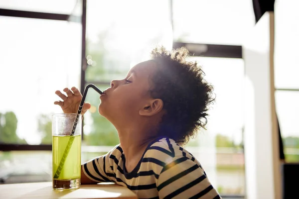 African american child drinking lemonade — Stock Photo, Image