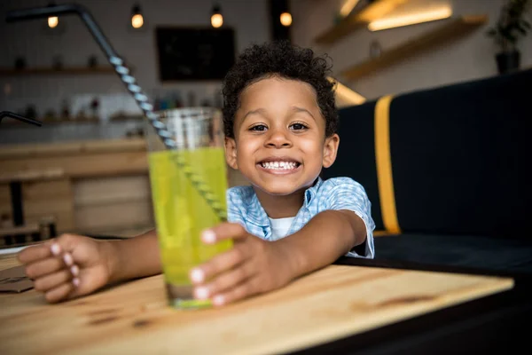 African american child drinking lemonade — Stock Photo, Image