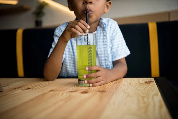 African american child drinking lemonade — Stock Photo, Image