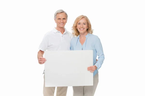 Seniorenpaar mit leerer Karte — Stockfoto