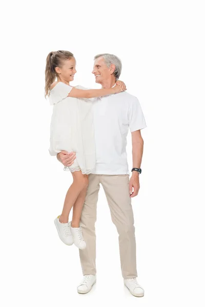 Grandfather holding on hands granddaughter — Stock Photo, Image