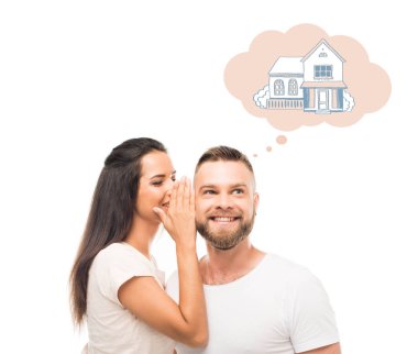 young woman whispering to boyfriends ear clipart