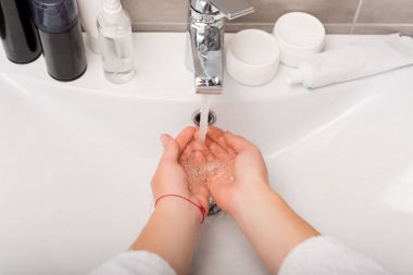 woman washing hands clipart