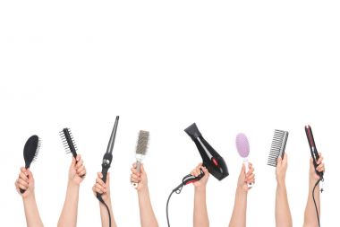 hands holding hairdressing tools  clipart