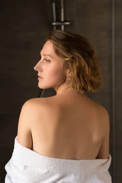 Young woman in towel — Stock Photo, Image